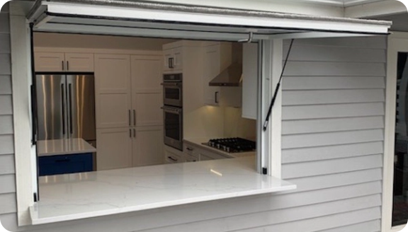 open gas strut kitchen pass-through window exterior